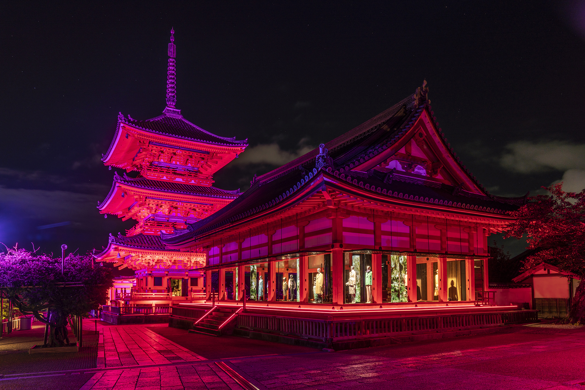 Gucci Aria in Kyoto, shot from the outside of the building covered in red light