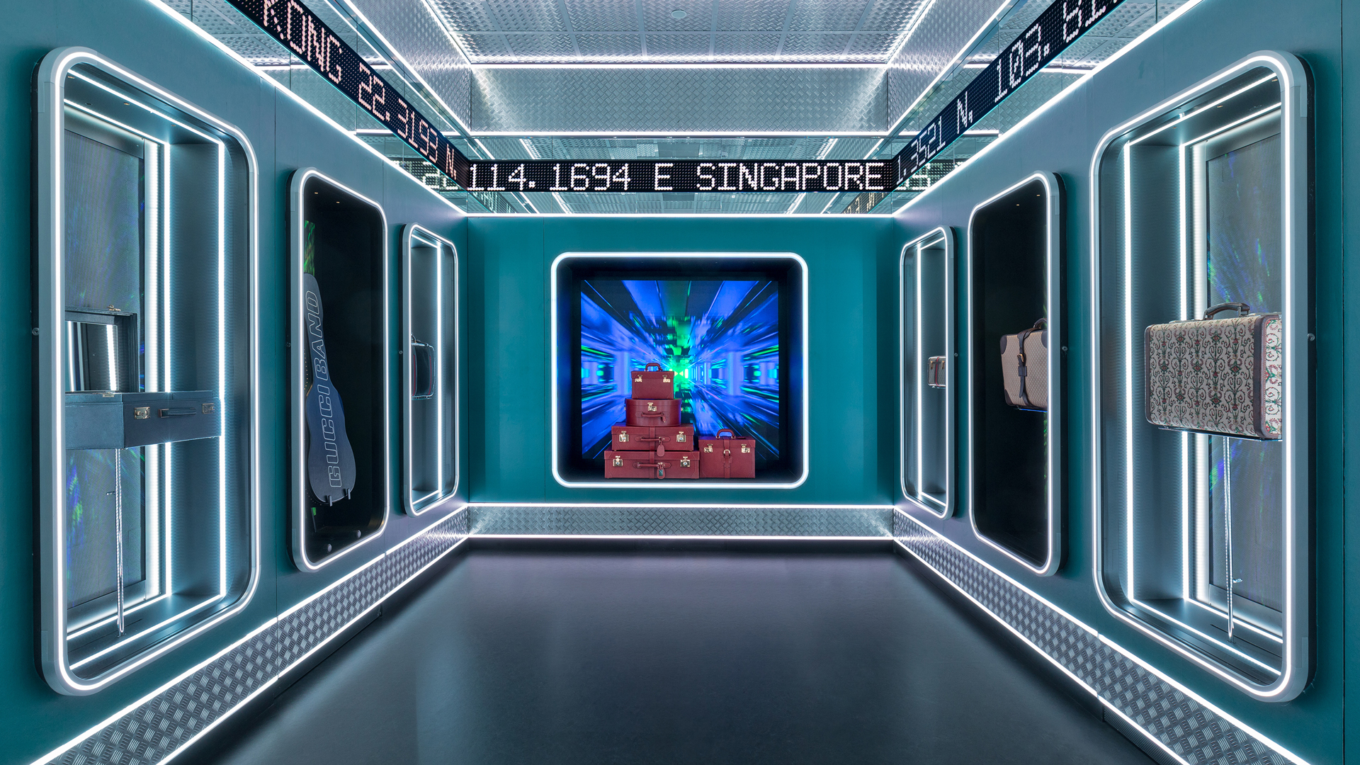 Blue room with capsule collection and interactive screens