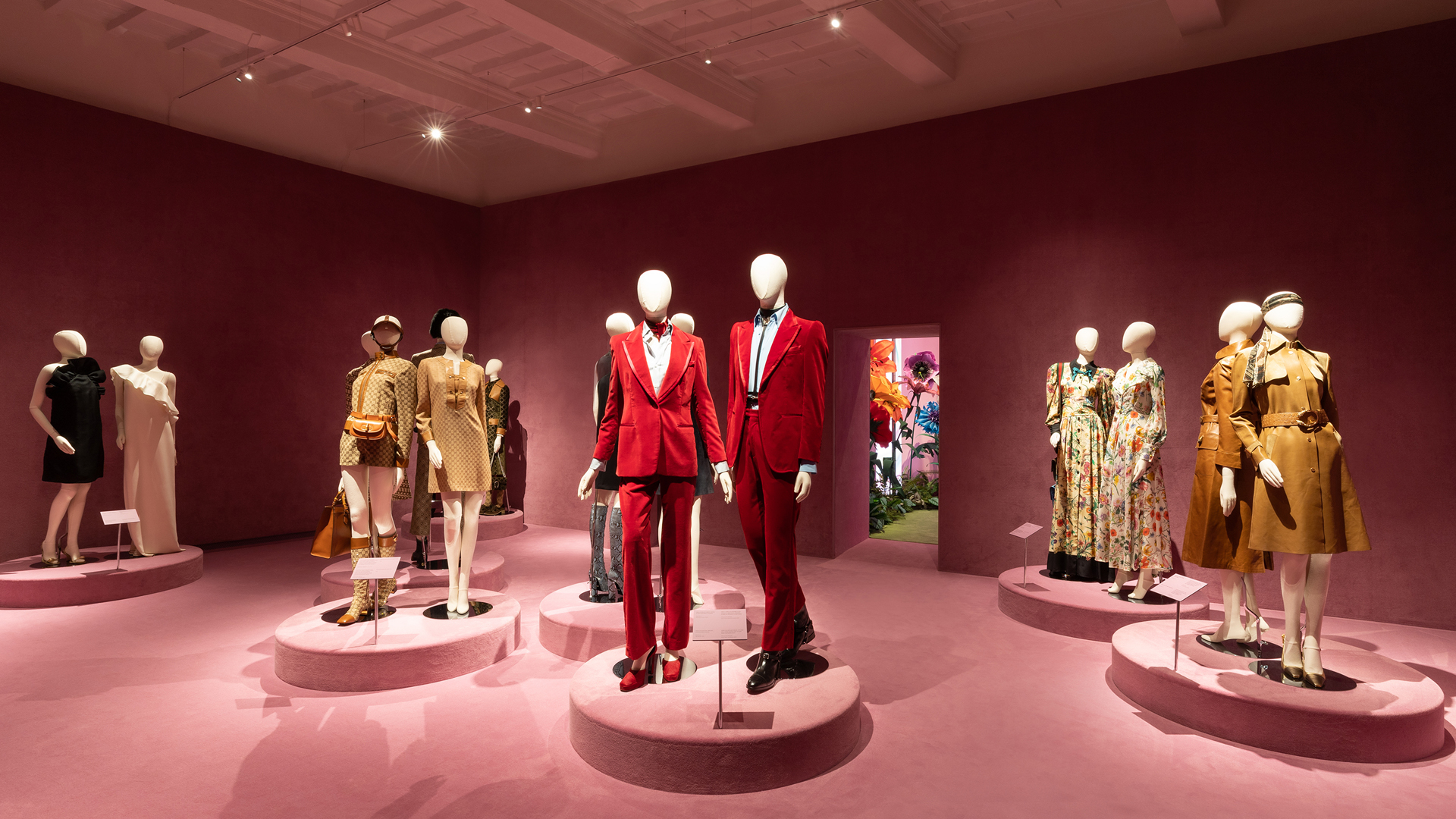 Pink room with mannequins and Gucci creations