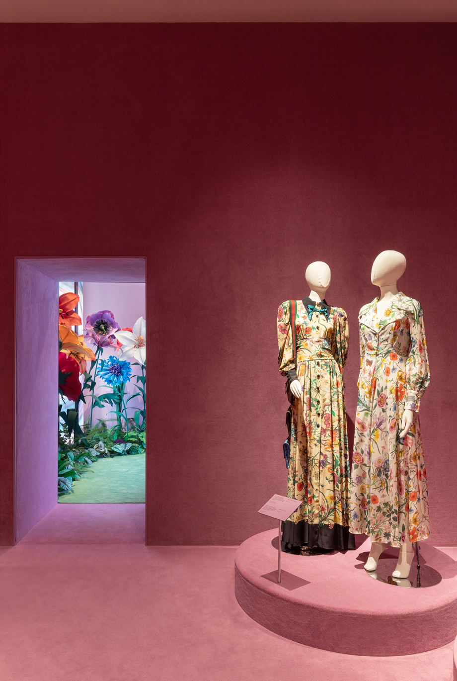 Gucci design in a pink room with mannequin